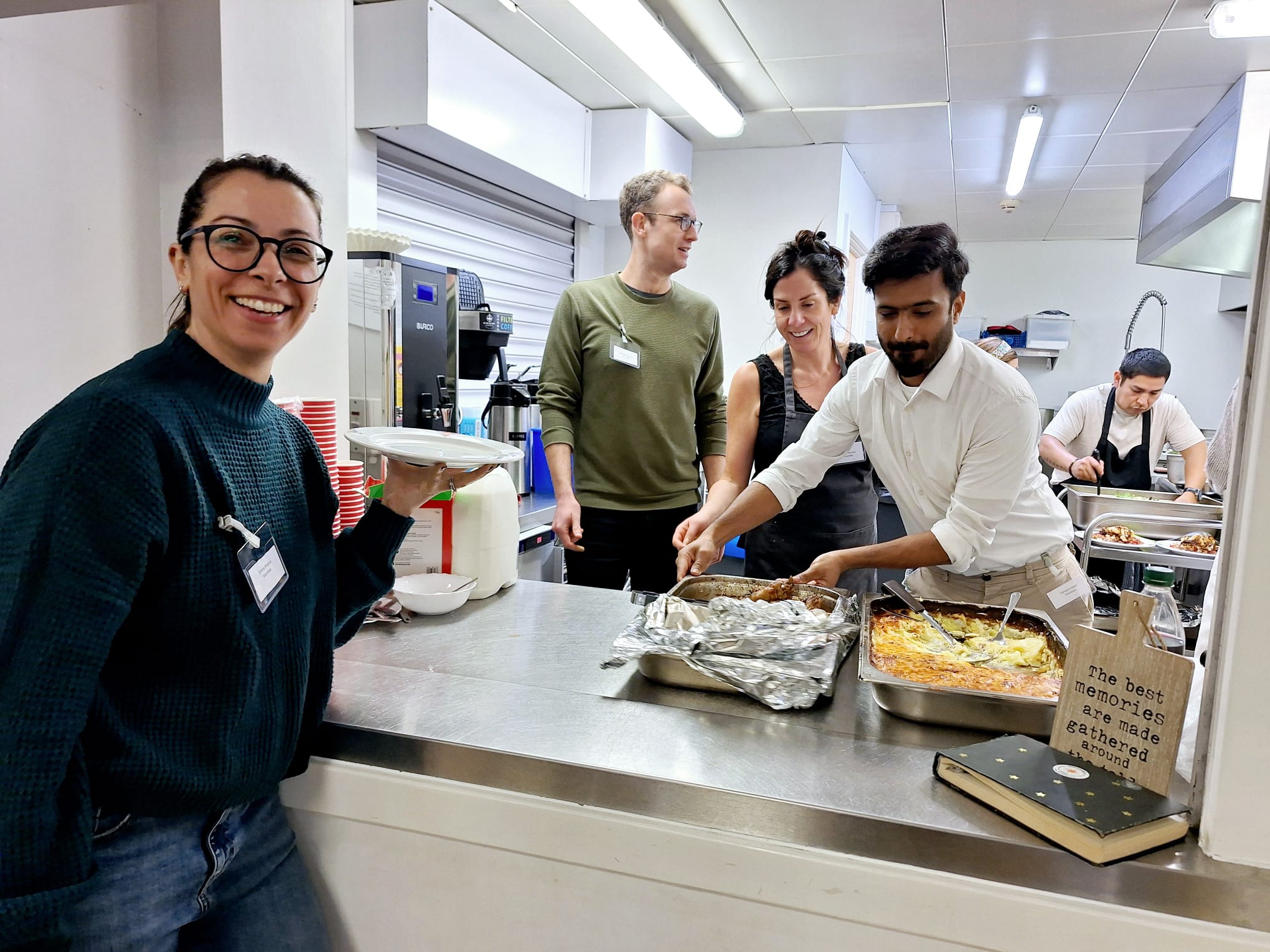 RX UK team volunteering in a kitchen